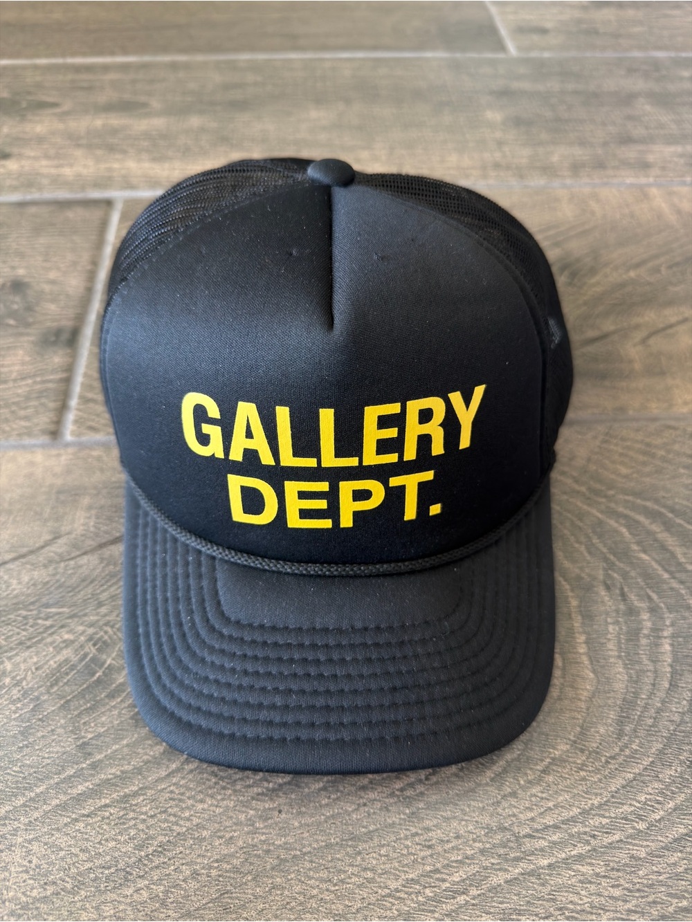 Gallery Dept. Black Trucker Hat with Yellow Logo